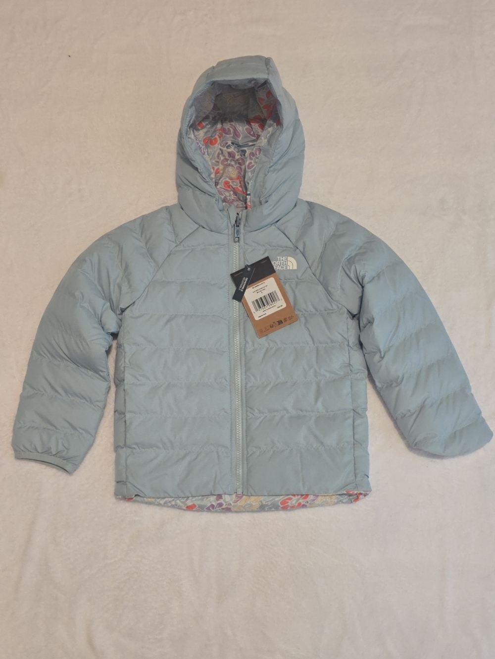 The North Face Light Blue Kids Hooded Puffer Jacket